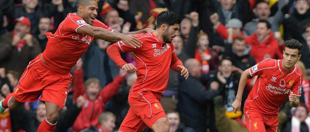 Glen Johnson (li.) und Philippe Coutinho feiern mit Emre Can den ersten Premier-League-Treffer des Ex-Leverkuseners.
