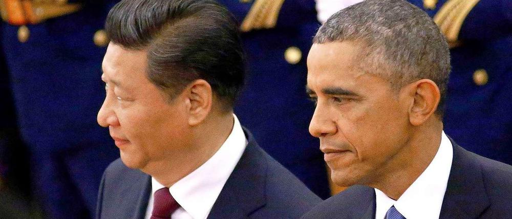 Der chinesische Parteichef Xi Jingping und US-Präsident Barack Obama in Peking.