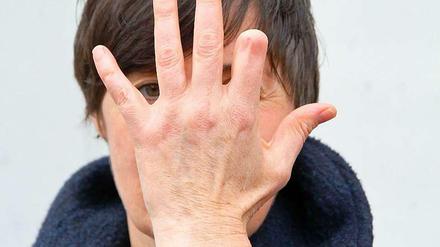 Zu wem gehört diese Hand? 