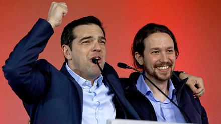 Brüder im Geiste. Alexis Tsipras (links), neuer griechischer Premier, und der Chef der spanischen Partei Podemos, Pablo Iglesias, bei einer Wahlkampfveranstaltung in Athen.