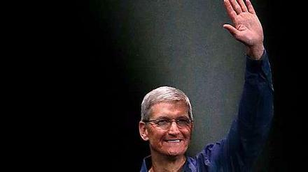Apples Tim Cook kann sich über einen Rekordgewinn freuen.