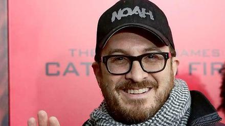 Erst 45 und noch schon mit langer Festivalkarriere: Darren Aronofsky. Der Schriftzug auf der kappe weist auf seinen jüngsten Film hin.