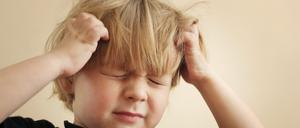 A four year old boy scratching his head Please see some similar images from my portfolio :