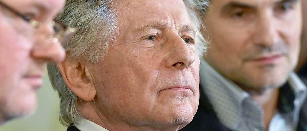 Roman Polanski mit seinen Anwälten am 25. Februar 2015 in Krakau. 