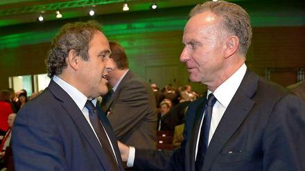 Einigkeit in der Chefetage: UEFA-Präsident Michel Platini (l.) und ECA-Chef Karl-Heinz Rummenigge freue sich über eine noch engere Zusammenarbeit zwischen dem verband und den Vereinen.