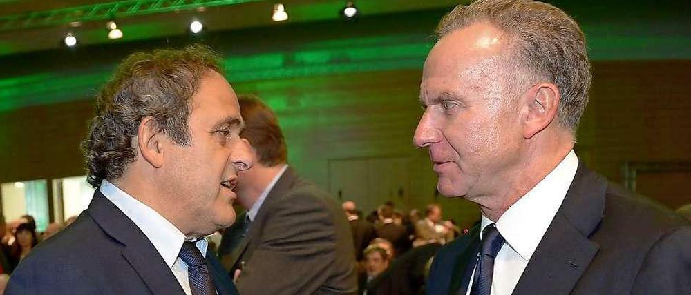 Einigkeit in der Chefetage: UEFA-Präsident Michel Platini (l.) und ECA-Chef Karl-Heinz Rummenigge freue sich über eine noch engere Zusammenarbeit zwischen dem verband und den Vereinen.