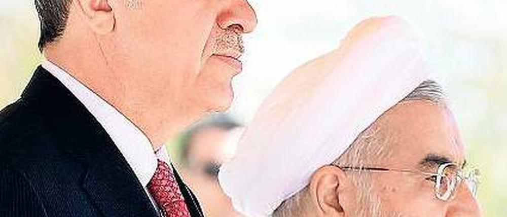 Irans Präsident Ruhani und sein türkischer Amtskollege Erdogan (links).