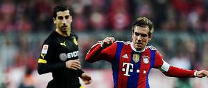 Enge Sache. Philipp Lahm (r.) und Dortmunds Henrich Mchitarjan.