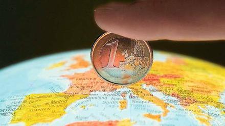 Krise! Welche Krise? Anleger kehren in die Euro-Zone zurück, sie hoffen auf Gewinne am Aktienmarkt. Foto: Patrick Pleul/dpa