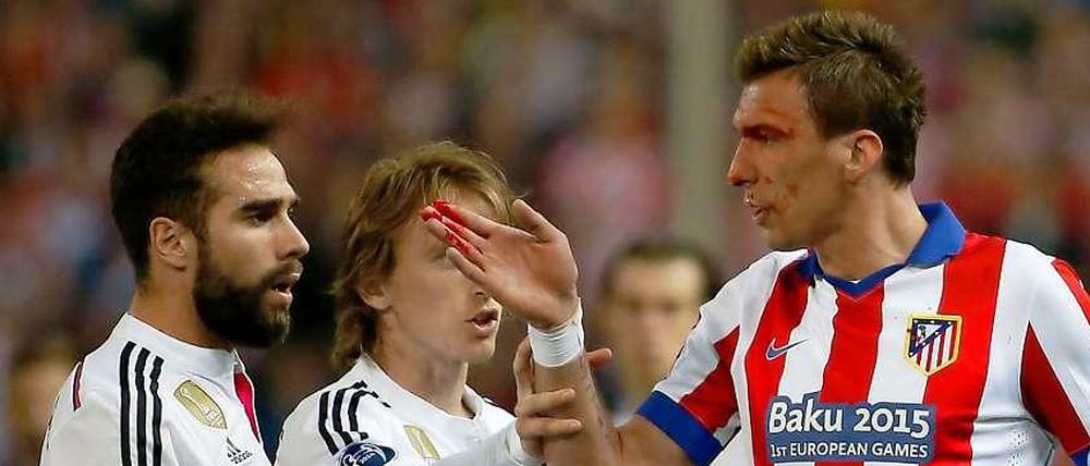 Ein blutverschmierter Kampf: Atlético Madrid gegen den Stadtrivalen Real.