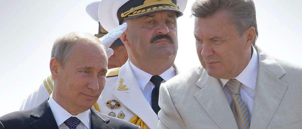 Der frühere ukrainische Präsident Viktor Janukowitsch und Russlands Präsident Wladimir Putin.