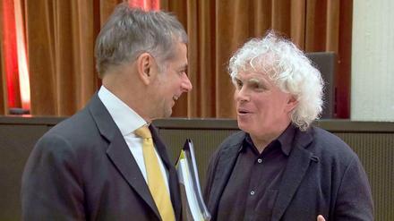 Intendant Martin Hoffmann und Chefdirigent Sir Simon Rattle bei der Jahrespressekonferenz.