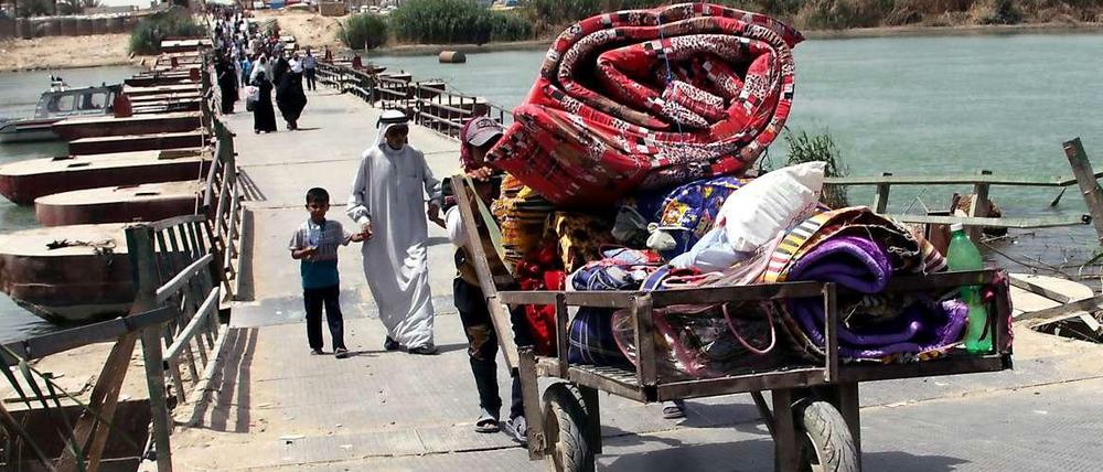 Viele Einwohner fliehen derzeit aus Ramadi.