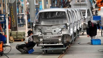 Wir bauen Elektroautos: Die Fabrik von Kangdi Vehicles in Changxing bei Shanghai. Fünf Millionen E-Autos sollen bis 2020 auf Chinas Straßen rollen.