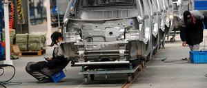 Wir bauen Elektroautos: Die Fabrik von Kangdi Vehicles in Changxing bei Shanghai. Fünf Millionen E-Autos sollen bis 2020 auf Chinas Straßen rollen.