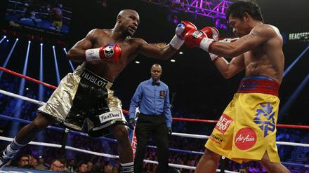 Nicht nur im Ring in der Offensive: Floyd Mayweather (li.) gegen Manny Pacquiao.