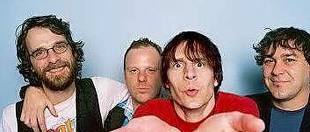 Mudhoney 2014, links Gitarrist Steve Turner, der Mann mit den großen Händen und dem roten Shirt ist Mark Arm.