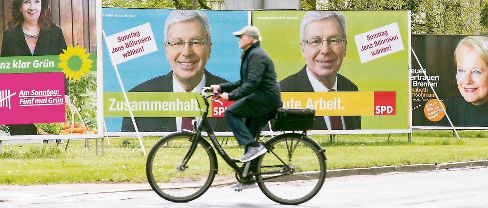 Wahlplakate mit den Konterfeis von Bürgermeister Jens Böhrnsen (SPD), Elisabeth Motschmann (CDU, r) und Karoline Linnert (Bündnis 90/Die Grünen). 