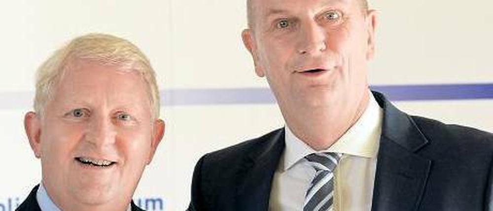 Enge Partner. Arne Feuring (links) posierte 2013 noch mit Dietmar Woidke (SPD), dem damaligen Innenminister