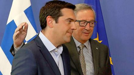 Krisengespräch in Brüssel. Der griechische Ministerpräsident Alexis Tsipras (links) und EU-Kommissionschef Jean-Claude Juncker.