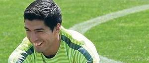 Zähne zeigen. Barças Luis Suarez schüchtert Juve vorab schon mal ein.