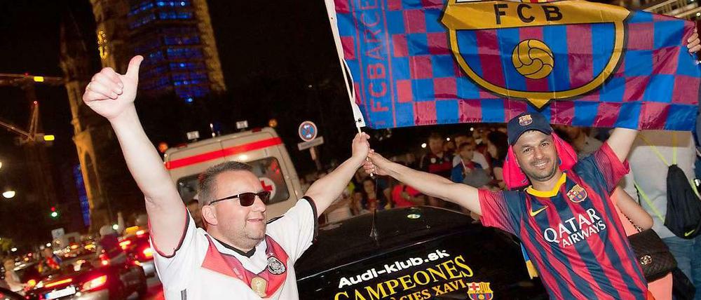 Gemeinsam und friedlich: Fußball-Fans feiern nach dem Champions-League-Finale gemeinsam am Breitscheidplatz.