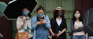 Aus Angst vor dem Mers-Virus tragen viele Menschen in Südkorea Gesichtsmasken. Hier Touristen in Seoul.