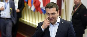Griechenlands Ministerpräsident Alexis Tsipras nach dem Treffen mit Frankreichs Präsident Francois Hollande and Kanzlerin Angela Merkel