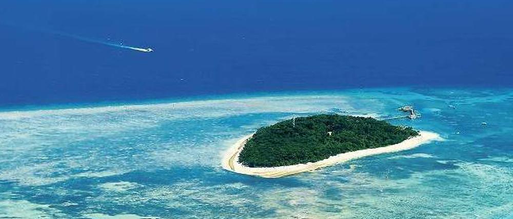 Gefährdete Farbenpracht. Das Great Barrier Reef vor der Ostküste Australiens wird durch Klimawandel, Stürme und Abwässer aus der Landwirtschaft massiv unter Druck gesetzt.