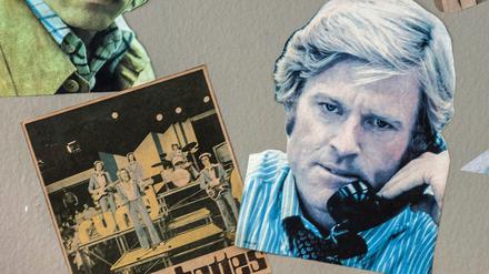 Ausgeschnittene Fotos von US-Schauspieler Robert Redford und der britischen Popgruppe "The Rubettes" sind auf einer Wand im ehemaligen Staatsratsgebäude der DDR zu sehen.