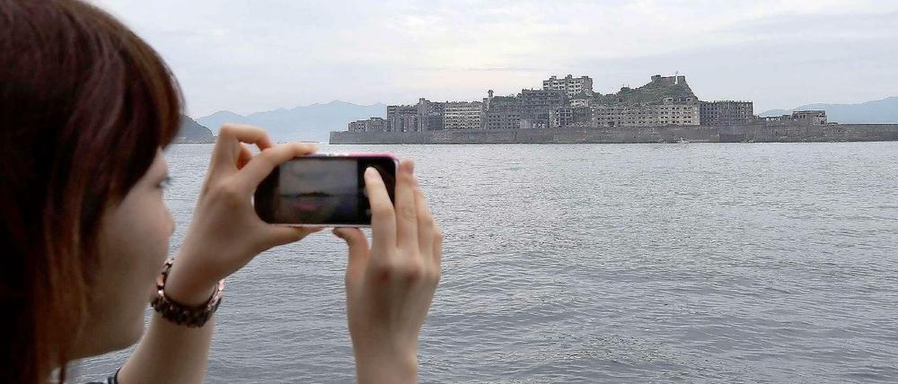 Neu auf der Liste. "Battleship Island", ein ehemaliger Kohle-Komplex in Japan. Südkorea protestierte gegen die Anerkennung, denn dort arbeiteten einst Kriegsgefangene.