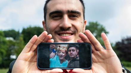 2015 kam Anas Modamani als Geflüchteter nach Deutschland – und schoss ein Selfie mit der Kanzlerin.