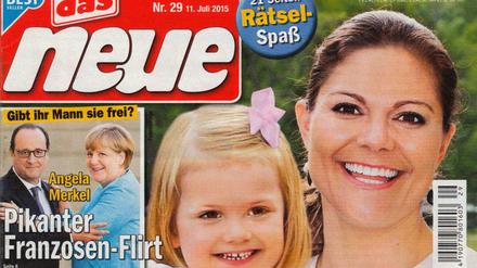 Bei einem "pikanten Franzosen-Flirt" will "Das Neue" Kanzlerin Angela Merkel beobachtet haben. 