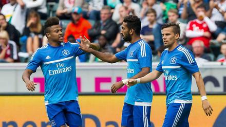 Die Hamburger Ronny Marcos, Mohamed Gouaida und Zoltan Stieber (von links) bejubeln den Turniersieg.