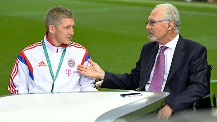 Verschiedener Meinung: Bastian Schweinsteiger (links) und Franz Beckenbauer.
