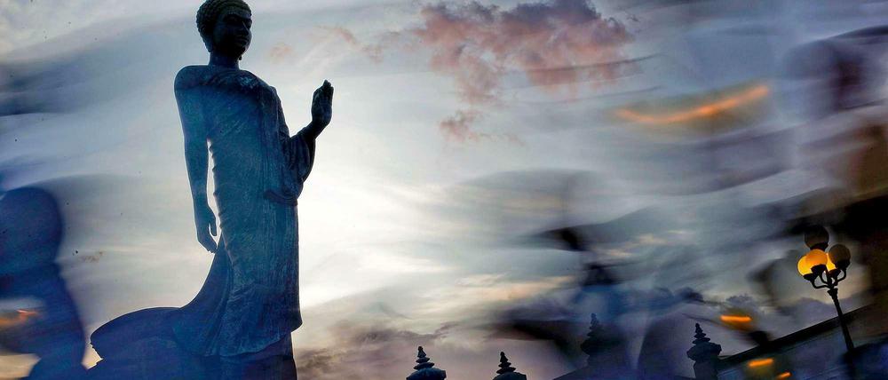 Menschen buddhistischen Glaubens sind in Berlin eine Minderheit.