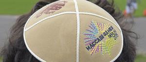 Die Kippa zum Event: Auf der jüdischen Kopfbedeckung kommen Sport und Glaube zusammen - sie haben die Sportler nach Berlin geführt.