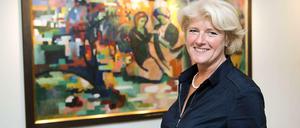 Harsche Kritik muss Kulturstaatsministerin Monika Grütters entgegennehmen: Sie will die Ausfuhr von "national wertvollem" Kulturgut stärker reglementieren. Hier steht sie im Kanzleramt vor dem Gemälde "Orientalisches Märchen" (1912) von August Macke.