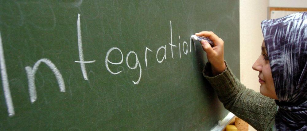 Die Zuwanderung nach Deutschland hat deutlich zugenommen. Unser Foto: Eine türkische Frauen in einem Schulungsraum für Menschen mit Migrationshintergrund in Hamburg. 