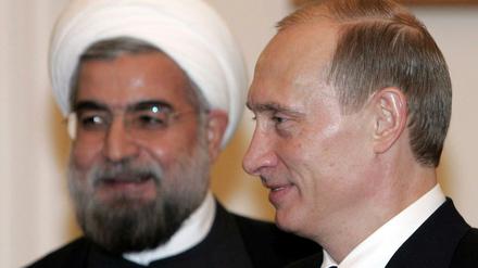 Wladimir Putin (r.) und Hassan Rohani 