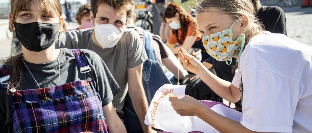 Greta Thunberg und weitere Unterstützer von Fridays for Future auf der Straße in Berlin. 
