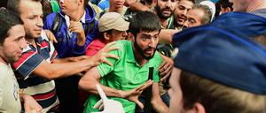 Flüchtlinge protestieren gegen die Maßnahmen in Ungarn.