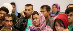 Flüchtlinge in der Notunterkunft Karlshorst in Berlin