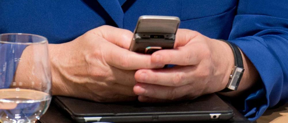 Regieren per Smartphone - auch dafür ist die Bundeskanzlerin bekannt.