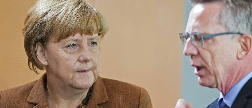 Angela Merkel und Thomas de Maizière.