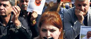 Mund halten. Demonstranten in Ankara werfen der Regierung vor, die Hintergründe des Anschlags mit fast 100 Opfern verschweigen zu wollen.