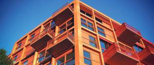 Eine auffällige Architektur und ein roter Außenanstrich prägen das Projekt „Am Lokdepot“ nahe dem Gleisdreieck.