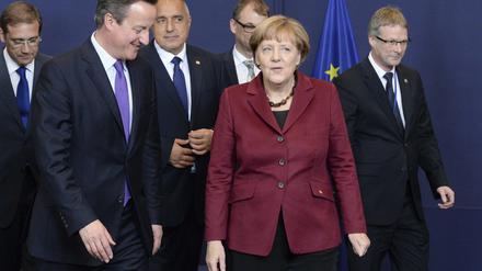 Bundeskanzlerin Angela Merkel (rechts) und der britische Premier David Cameron (links) beim EU-Gipfel.