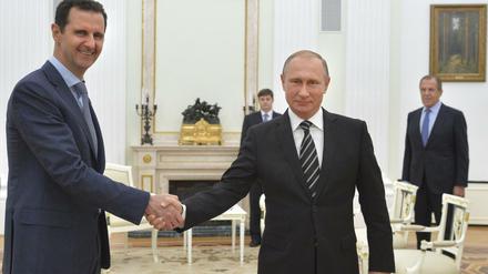 Syriens Präsident Baschar al Assad (links) und Russlands Präsident Wladimir Putin am 20. Oktober 2015 im Kreml. 