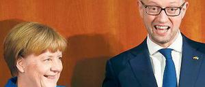 Gemeinsam eröffneten Kanzlerin Angela Merkel und der ukrainische Regierungschef Arseni Jazenjuk ein Wirtschaftsforum in Berlin.